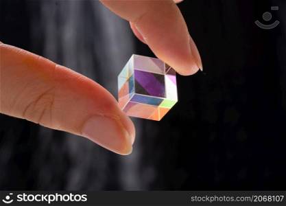 bright luminous prism cubes refract light in different colors. Physics optics ray refractions