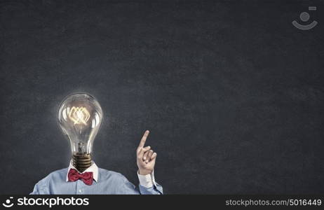 Bright mind. Unrecognizable man in bow tie with light bulb instead of head