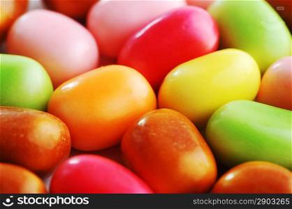 Bright multi-colour candies in sugar glaze