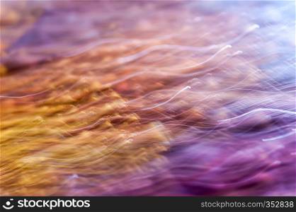 Bright multicolor abstract background with a motion blur effect. Digitally painted background effects. Smeared textures.. Bright multicolor abstract background with a digitally painted smeared effect.