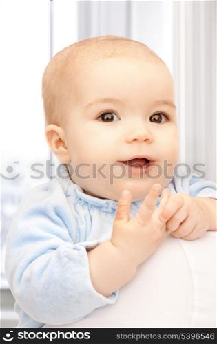 bright picture of adorable baby at home