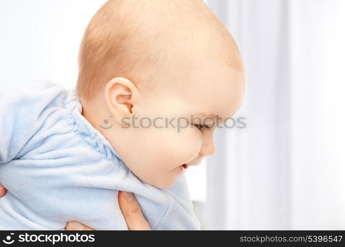 bright picture of adorable baby at home