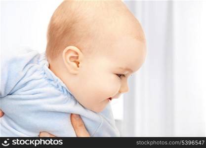 bright picture of adorable baby at home