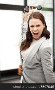 bright picture of angry businesswoman with phone