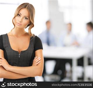 bright picture of attractive businesswoman in office