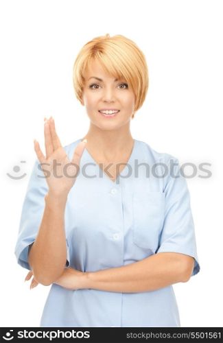bright picture of attractive female doctor over white&#xA;