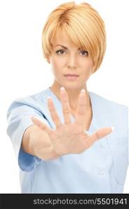 bright picture of attractive female doctor showing stop gesture&#xA;