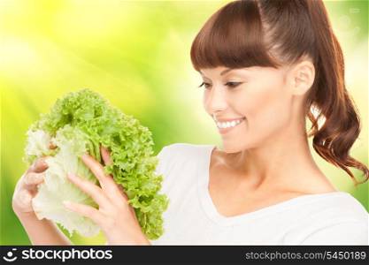bright picture of beautiful housewife with lettuce