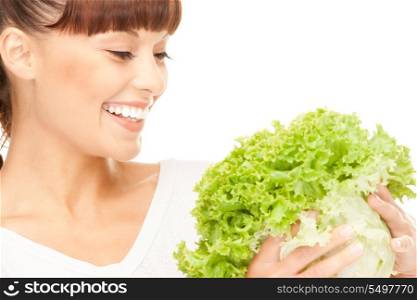 bright picture of beautiful housewife with lettuce over white&#xA;