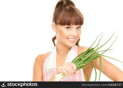 bright picture of beautiful housewife with spring onions over white&#xA;