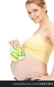 bright picture of beautiful pregnant woman with socks