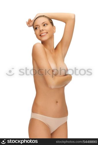 bright picture of beautiful topless woman in panties