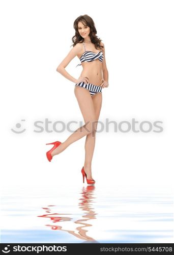 bright picture of beautiful woman in bikini and high heels