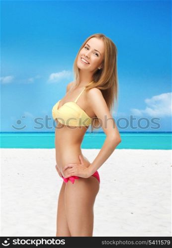 bright picture of beautiful woman in bikini on the beach