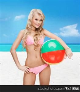 bright picture of beautiful woman in bikini with beach ball