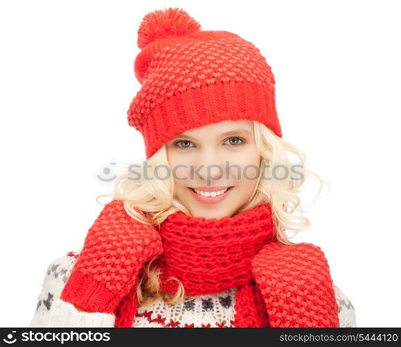 bright picture of beautiful woman in hat, muffler and mittens ..