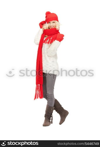 bright picture of beautiful woman in hat, muffler and mittens ..