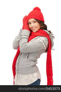 bright picture of beautiful woman in hat, muffler and mittens..