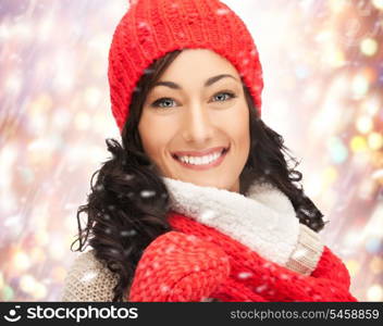 bright picture of beautiful woman in hat, muffler and mittens