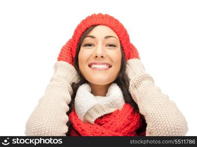 bright picture of beautiful woman in hat, muffler and mittens