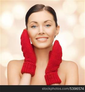 bright picture of beautiful woman in red mittens..