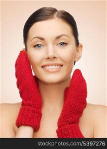 bright picture of beautiful woman in red mittens