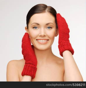 bright picture of beautiful woman in red mittens..