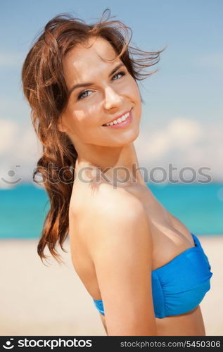 bright picture of beautiful woman on a beach