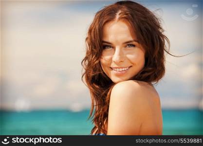 bright picture of beautiful woman on a beach