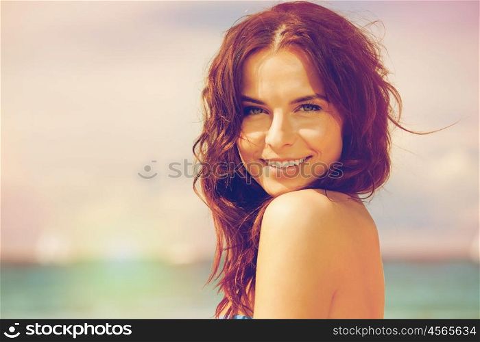 bright picture of beautiful woman on a beach. beautiful woman on a beach