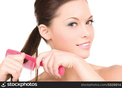 bright picture of beautiful woman with comb