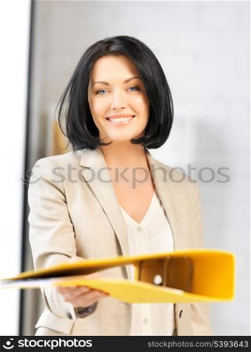 bright picture of beautiful woman with folder