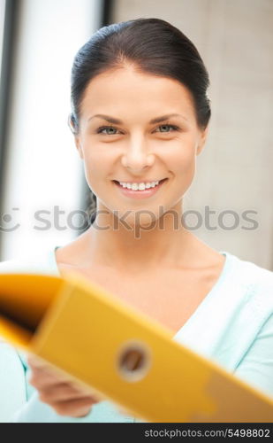 bright picture of beautiful woman with folder