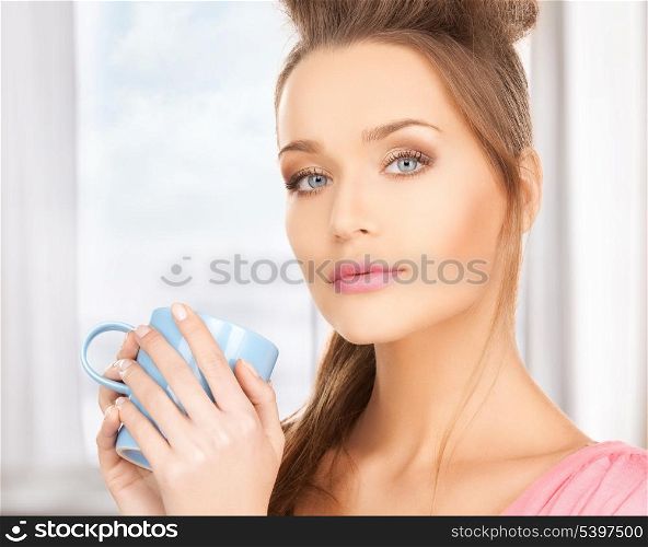 bright picture of beautiful woman with mug