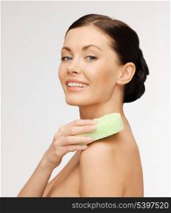 bright picture of beautiful woman with sponge