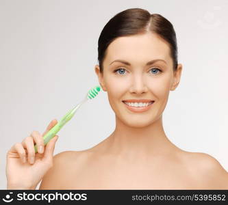 bright picture of beautiful woman with toothbrush