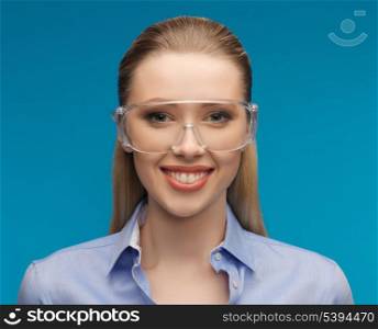 bright picture of businesswoman in protective glasses