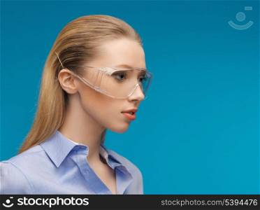 bright picture of businesswoman in protective glasses