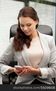 bright picture of businesswoman with cell phone