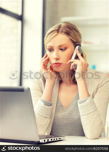 bright picture of businesswoman with cell phone. businesswoman with cell phone