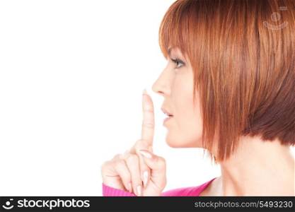 bright picture of businesswoman with finger on lips&#xA;