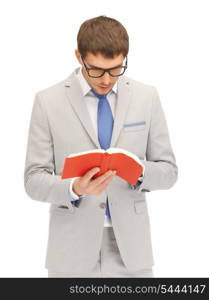 bright picture of calm and serious man with book