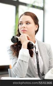 bright picture of calm businesswoman with phone