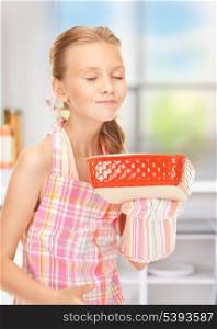 bright picture of cooking girl in the kitchen