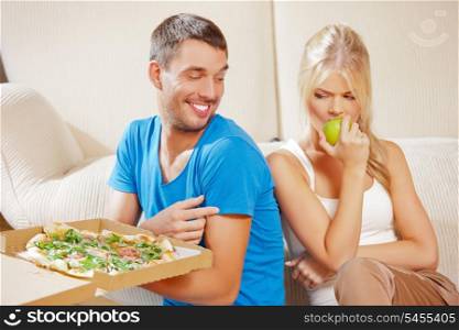 bright picture of couple eating different food (focus on man)