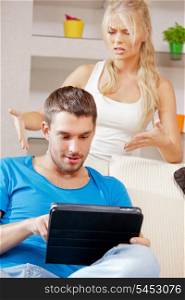 bright picture of couple with tablet PC
