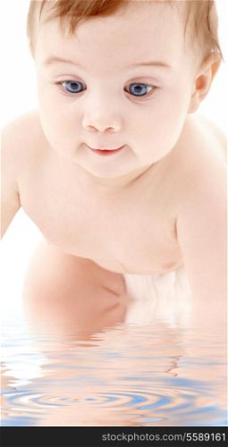 bright picture of crawling baby boy in water
