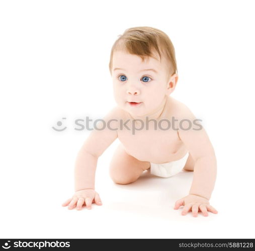 bright picture of crawling curious baby over white backgroubd