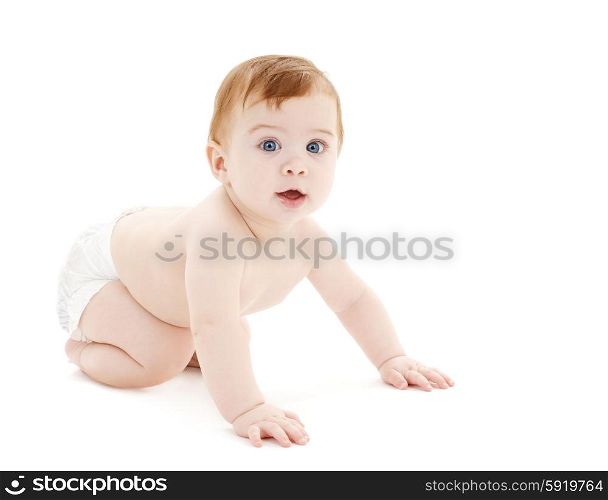 bright picture of crawling curious baby over white backgroubd. crawling curious baby