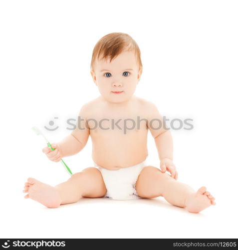bright picture of curious baby brushing teeth.